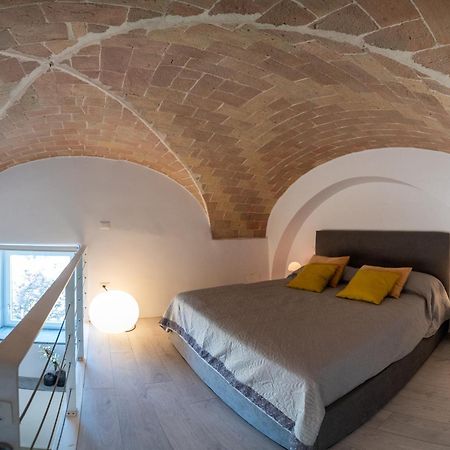 Palazzo Ricca Guarducci Piano Terra Apartment มอนเตเฟียสโกเน ภายนอก รูปภาพ